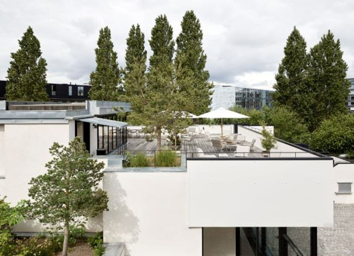 The Garage's rooftop terrace at Mogens Dahl Concert Hall. The image showcases the elegant and spacious terrace, offering a unique outdoor experience with a beautiful view. The rooftop terrace is perfect for various types of events, including receptions, weddings, and corporate parties.