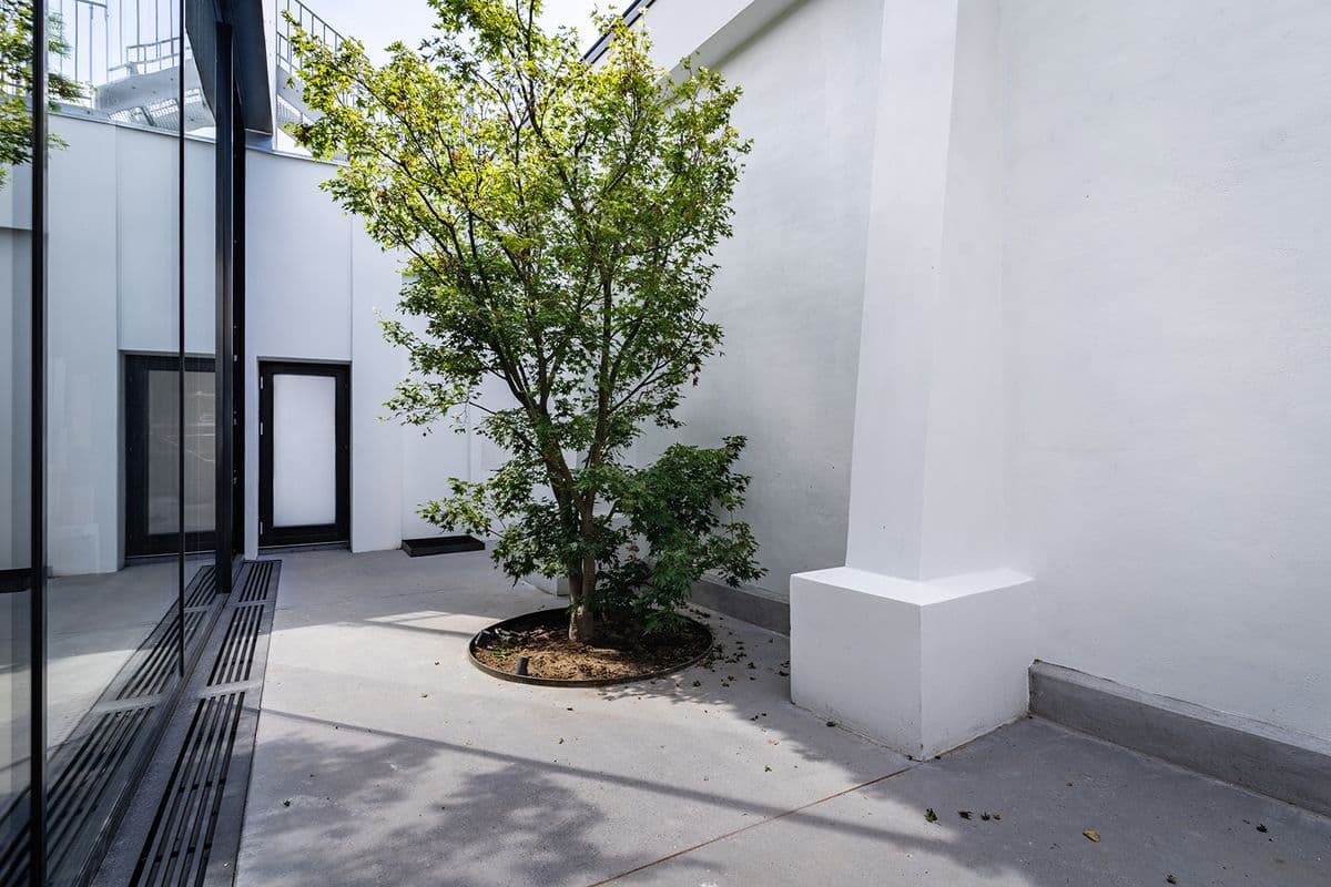 Outdoor photo of the Garage at Mogens Dahl Concert Hall, with a tree visible in the background. Contact us by phone or email for inquiries about events, bookings, or advice on your next party or event.